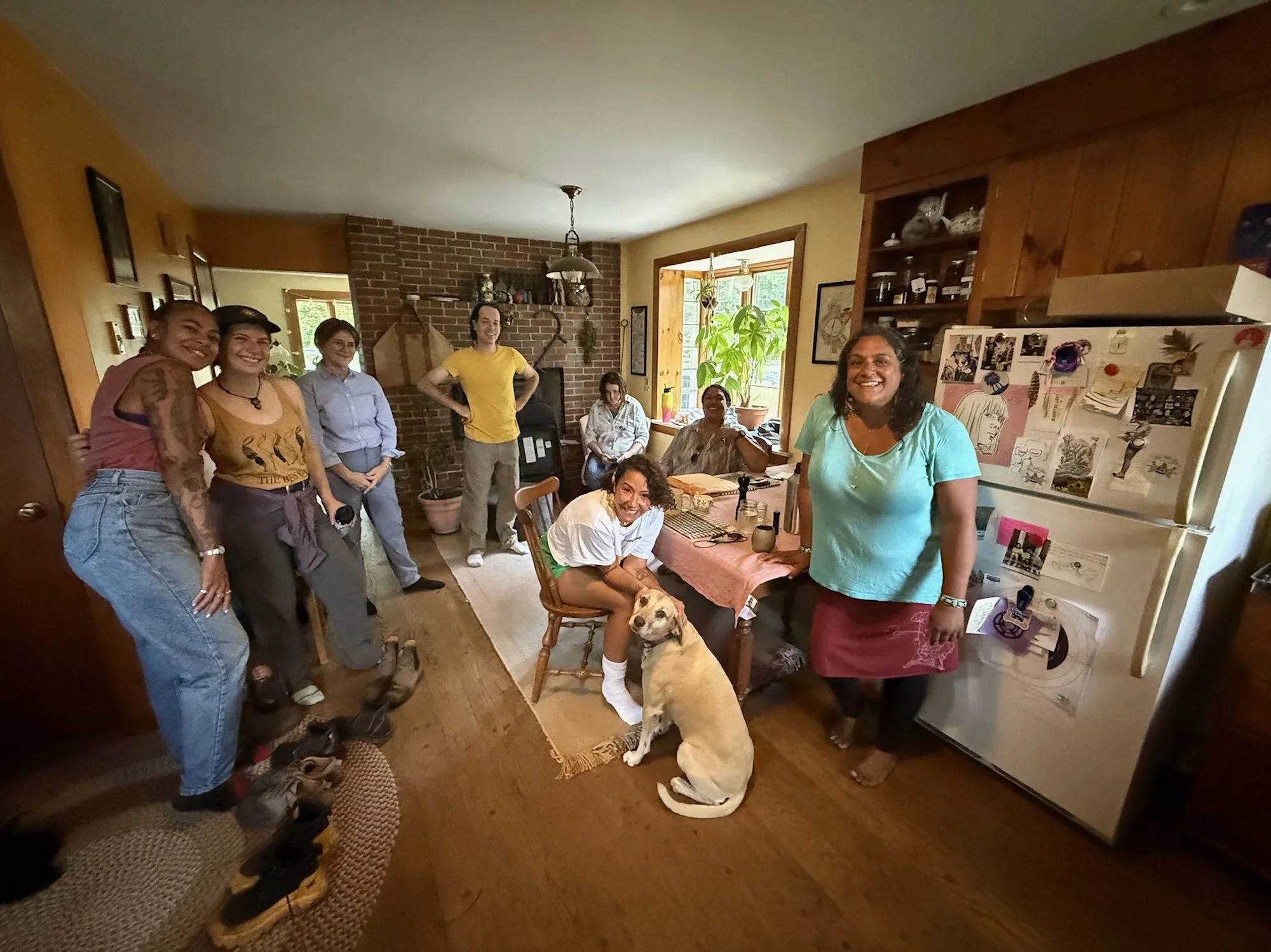 The They Keep Bees network leadership gathered in a kitchen