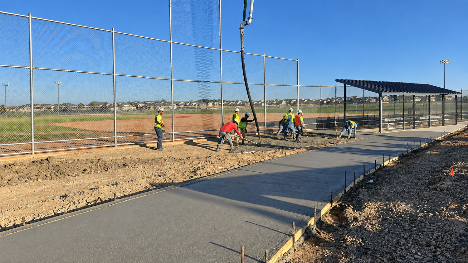 Commercial concrete flatwork crew placing a sidewalk on a Northern Colorado jobsite