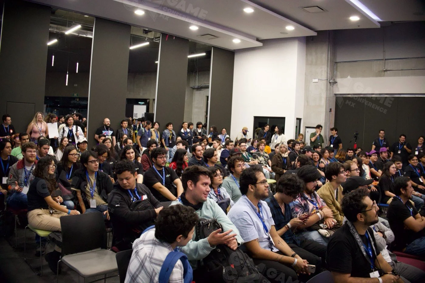 La audiencia durante una conferencia de GCMX 2025