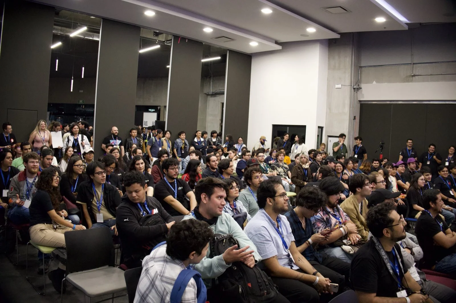 Sala llena durante una conferencia de GCMX 2025