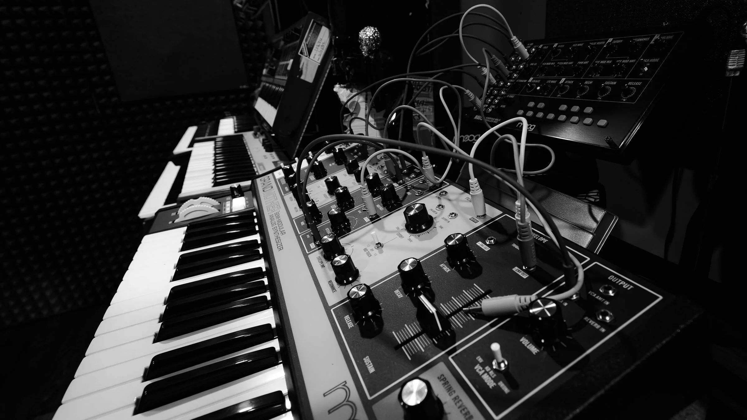 A synthesiser and patch cables in the academy studio