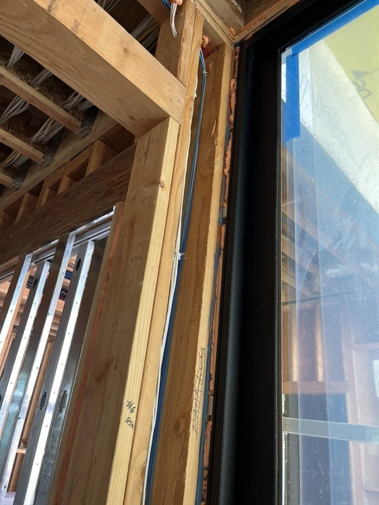 Window rough opening sealed with foam