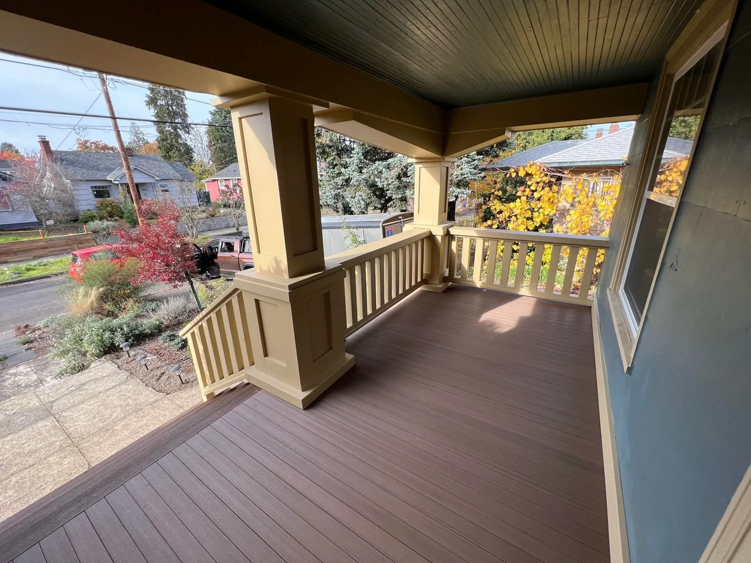 Front porch with new composite decking and Craftsman columns