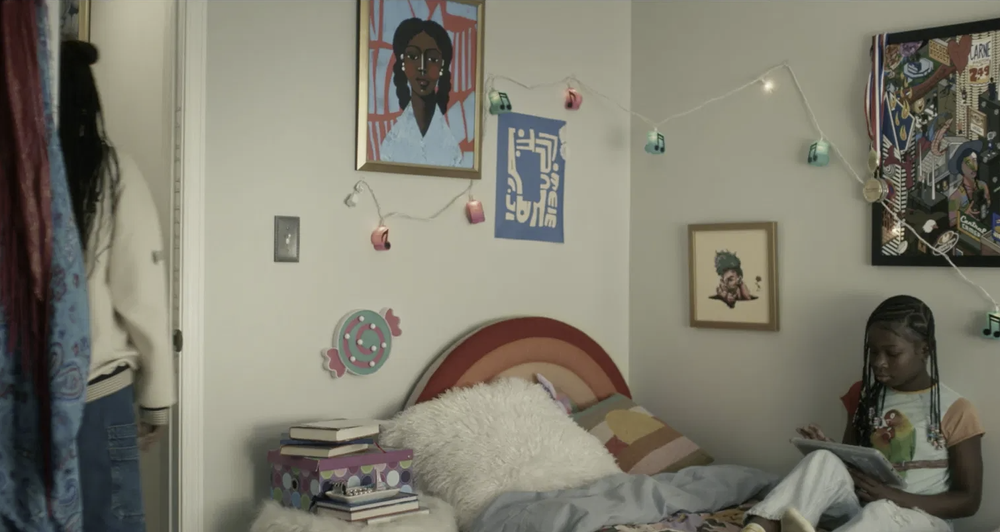 Scene still from The Bear, Season 4 Episode 4, showing Moriah and Yoku on a bedroom wall