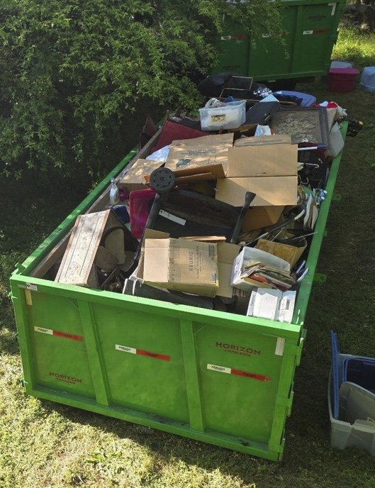 Full 14 yard dumpster at a job in Senoia Georgia
