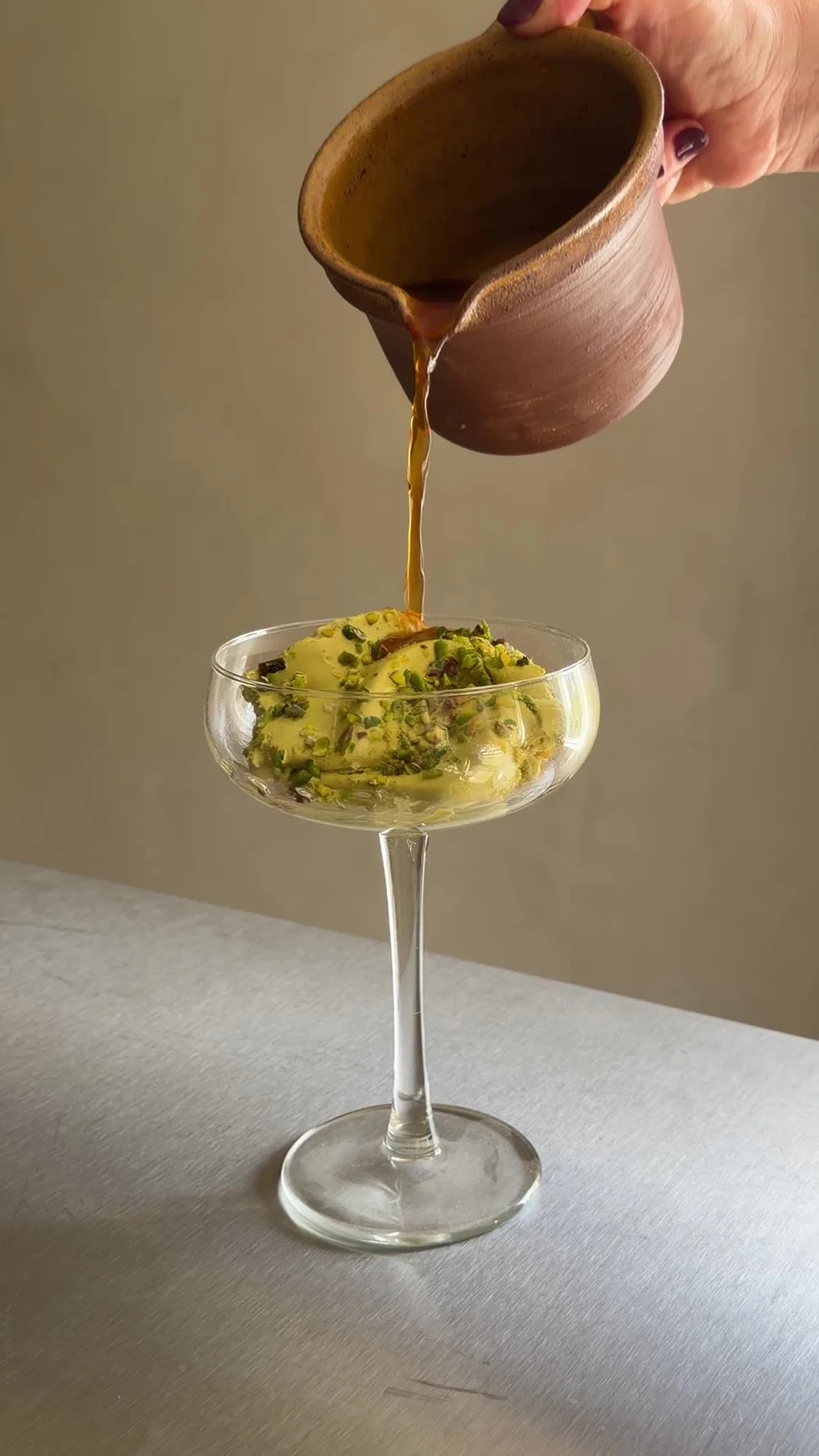 Espresso helles over pistasjgelato