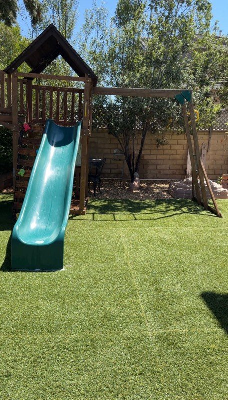Backyard playground artificial turf after a Hydroforce cleaning