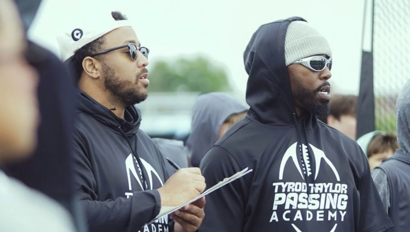 Tommy Reamon and Tyrod Taylor at the Tyrod Taylor Passing Academy