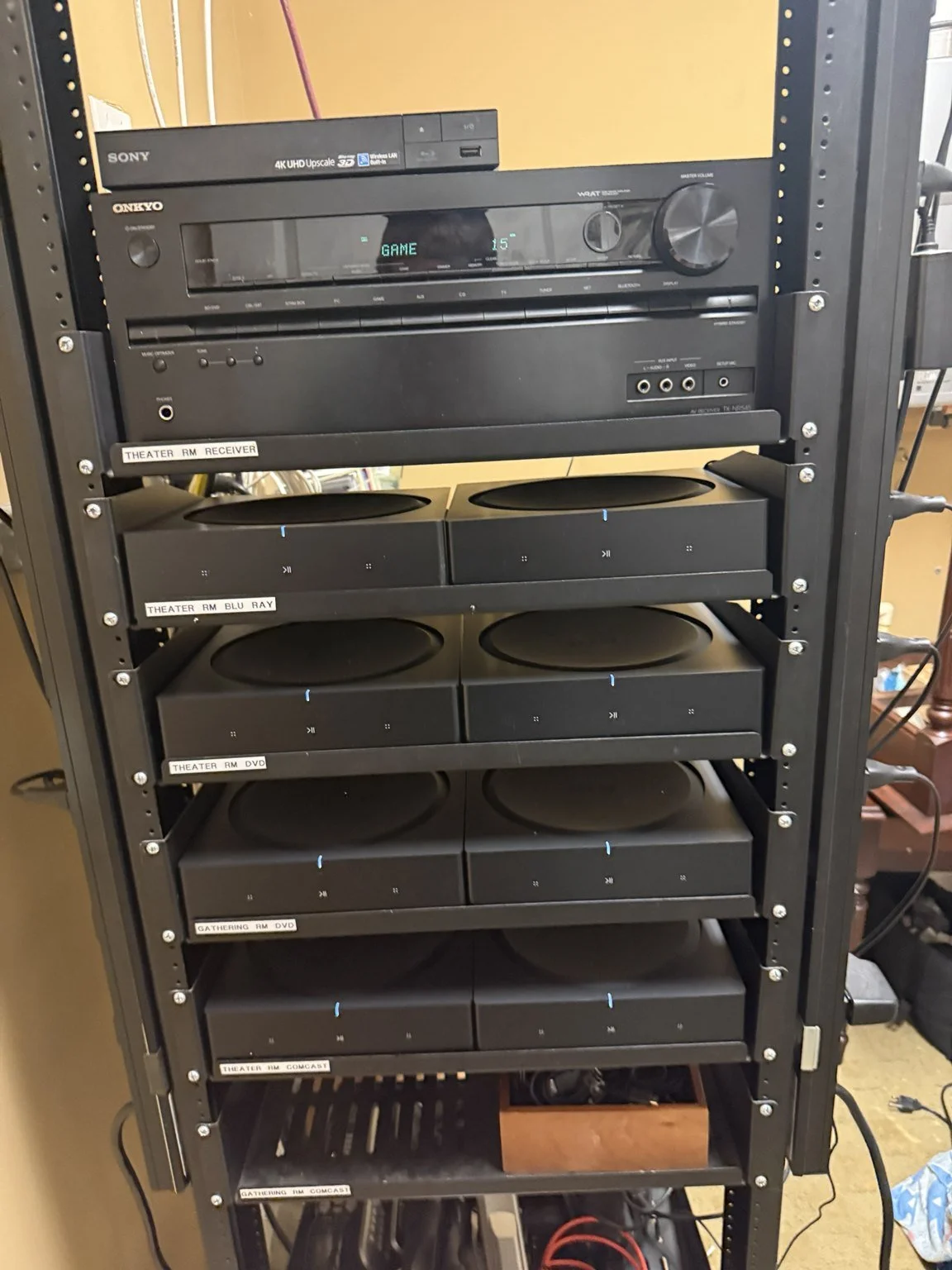 Audio equipment rack with Sonos and Denon components in the Amelia View project