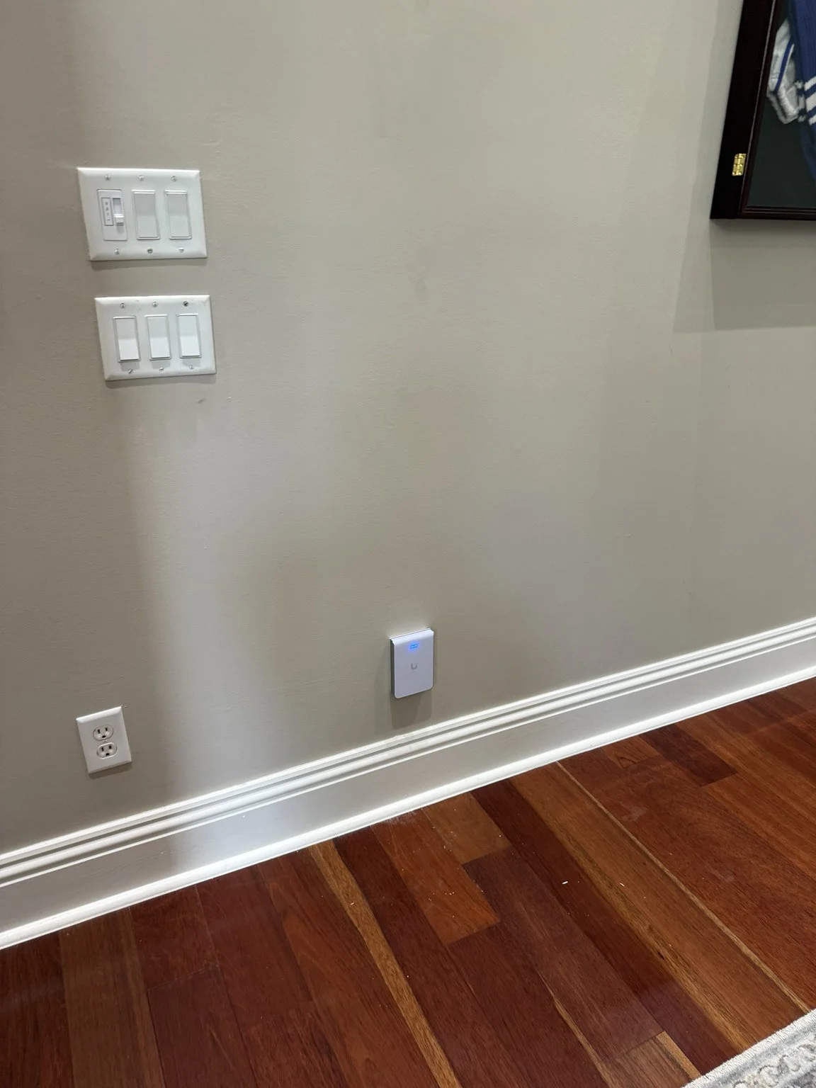 Ubiquiti UniFi in-wall access point installed at the Amelia View project