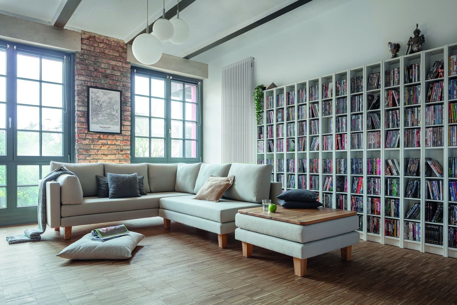Dormiente Lounge S natural corner sofa bed in a loft living room