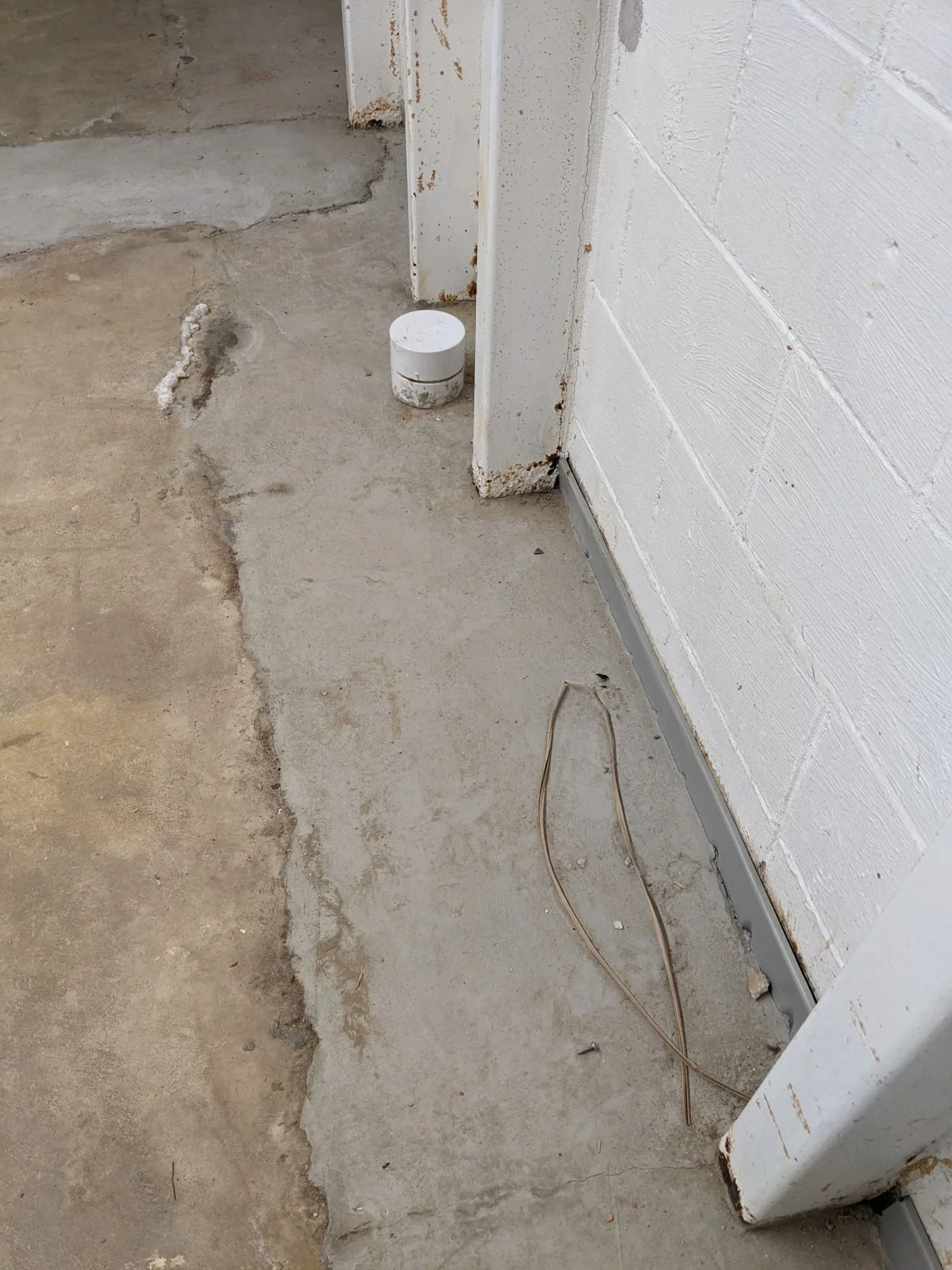 Seepage at the wall and through the floor