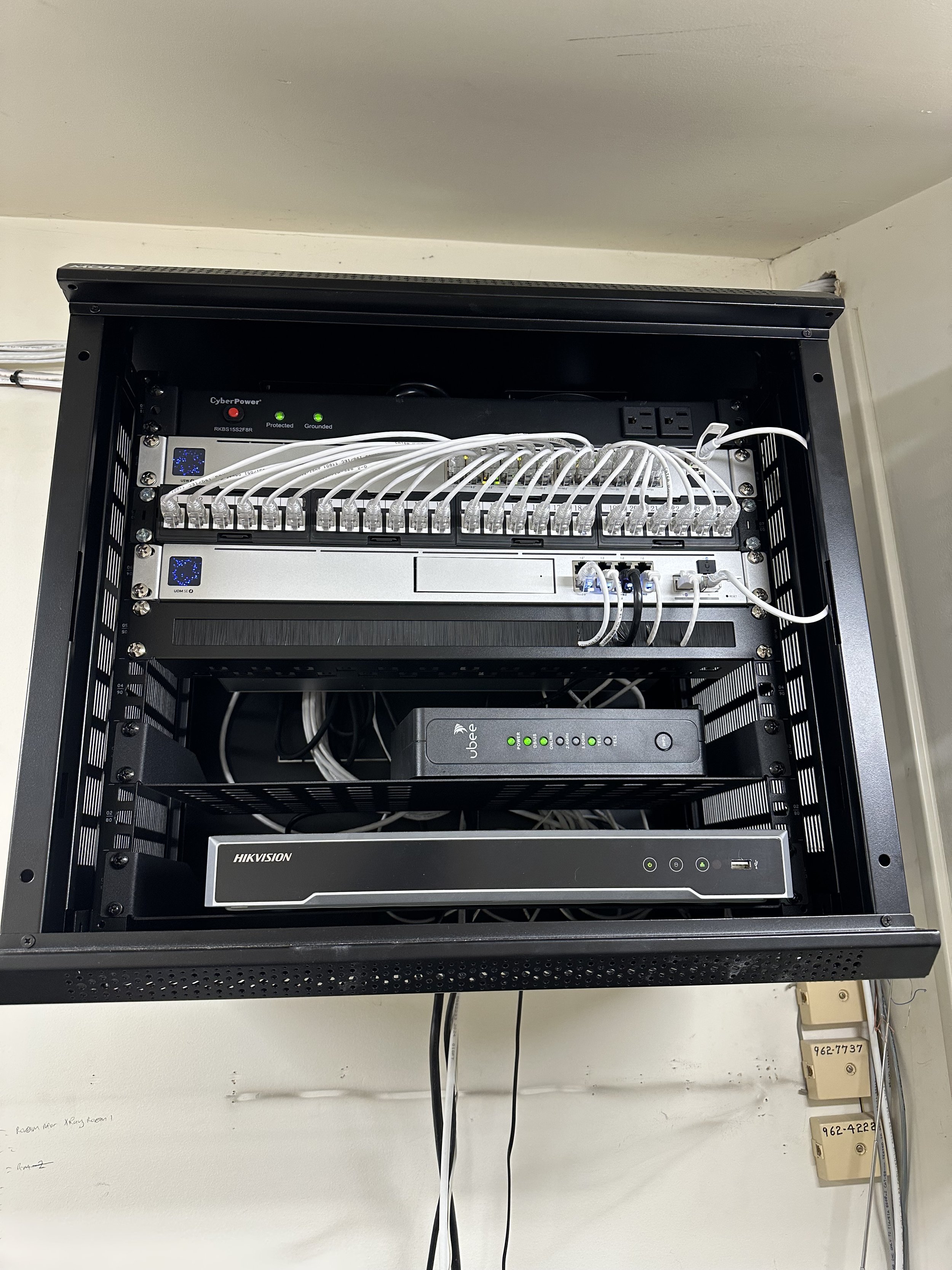 Wall-mounted network rack