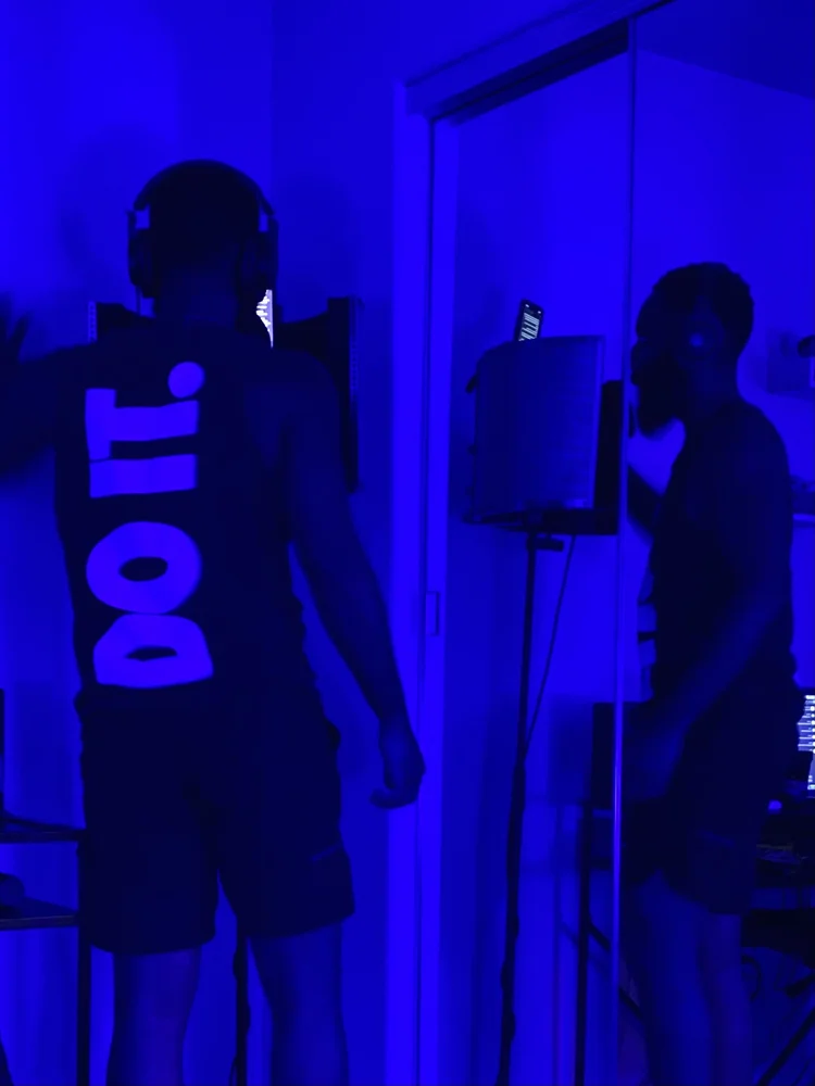 Recording in a blue-lit studio