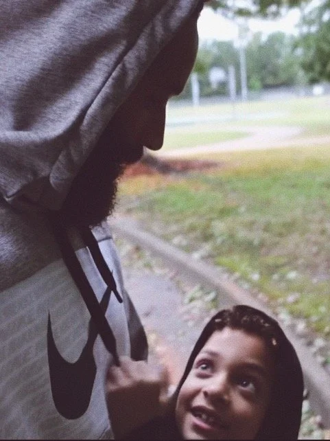 A father and son sharing a moment outdoors