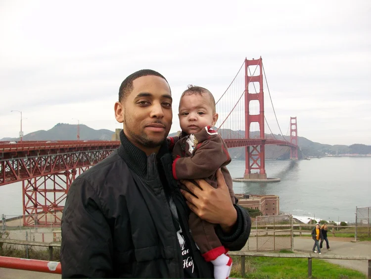 Father and baby near the Golden Gate Bridge