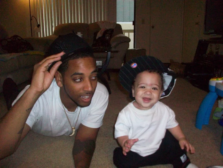 A father and child enjoying music at home