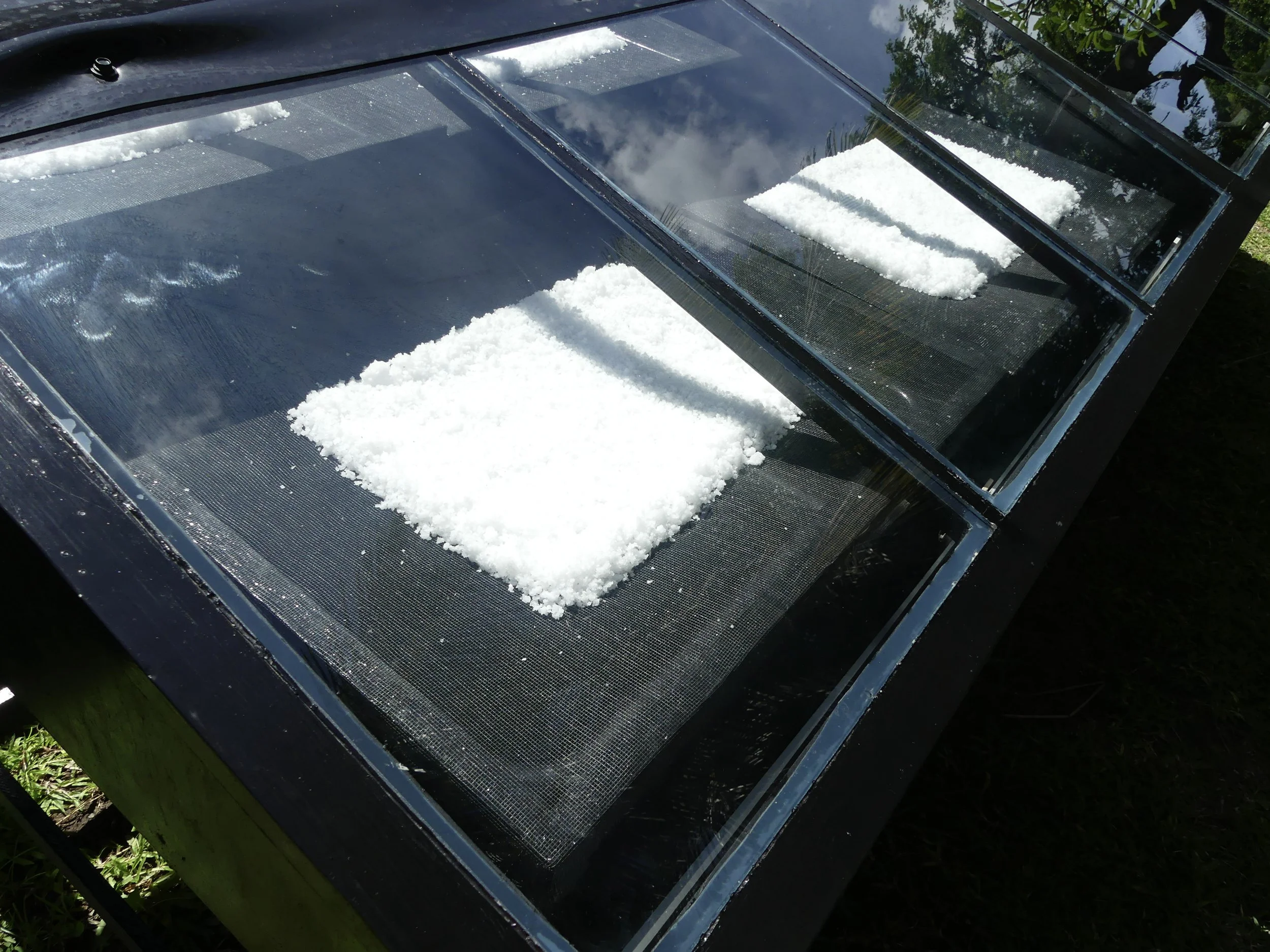 Salt evaporation pans at the Grenadine House salt farm, Bequia.