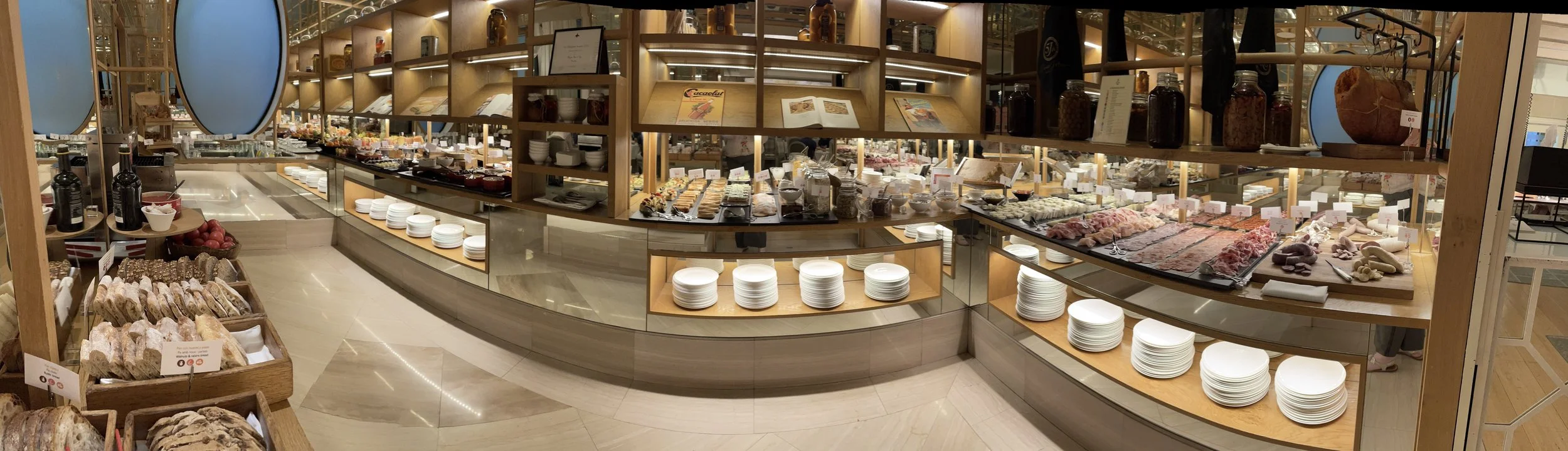 Inside the food hall — a panorama of stalls.