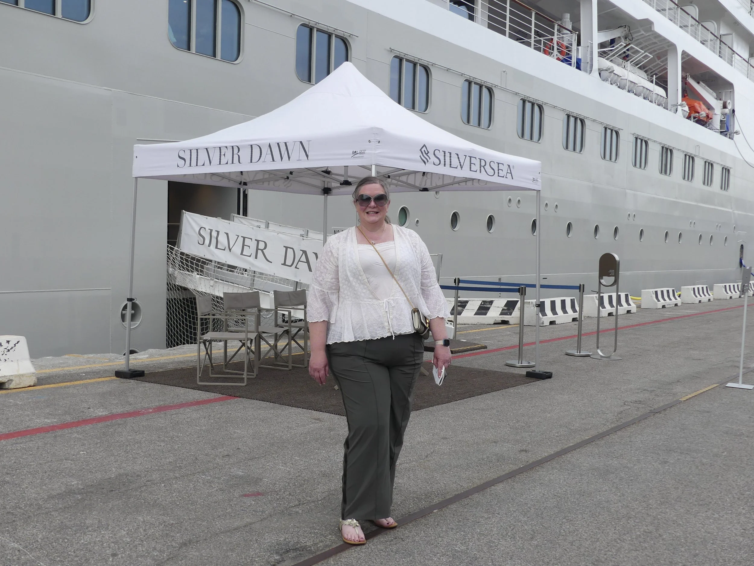 Under the Silver Dawn tent at the dock — we're boarding.