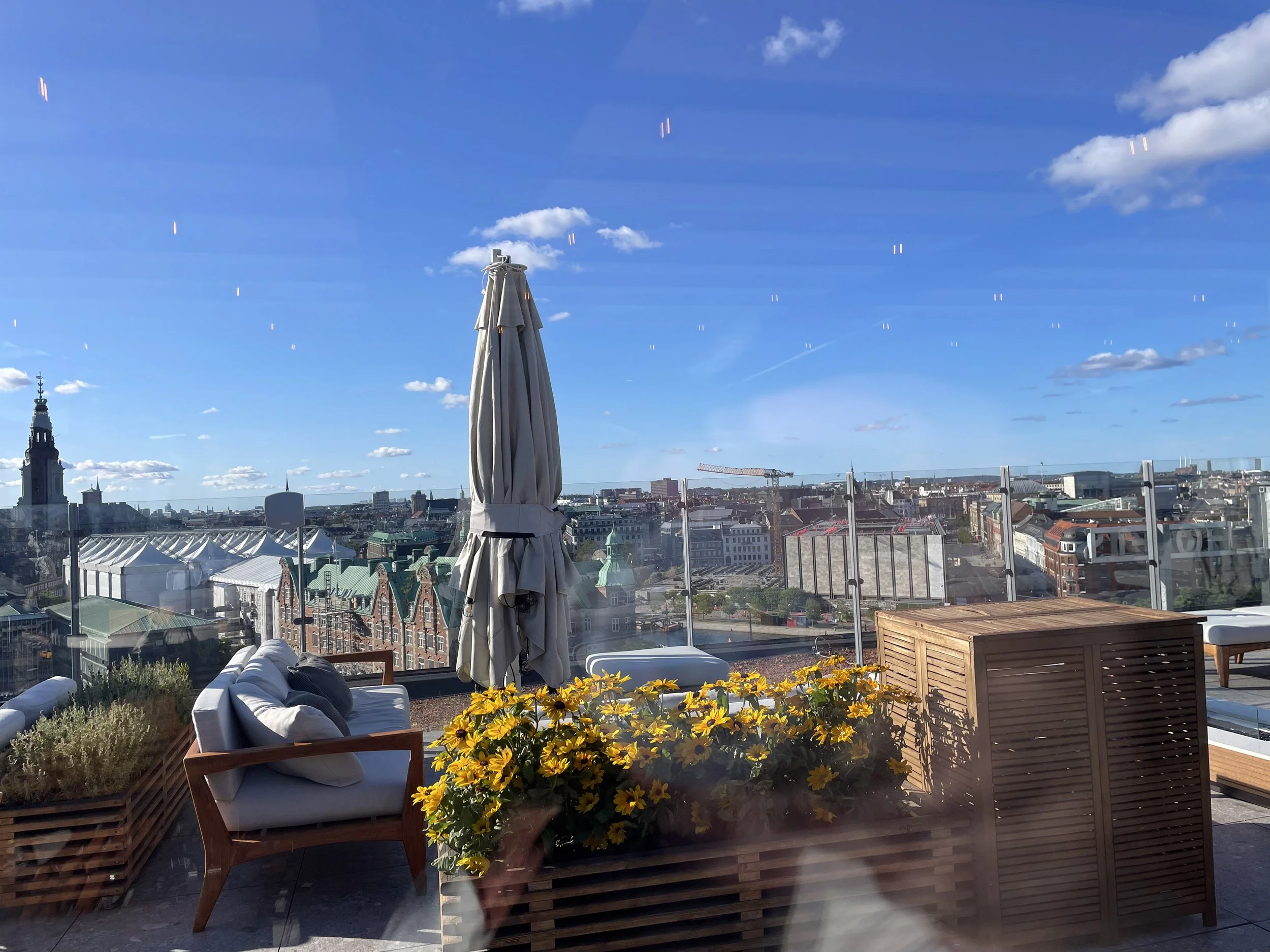 Copenhagen's skyline from a rooftop terrace.