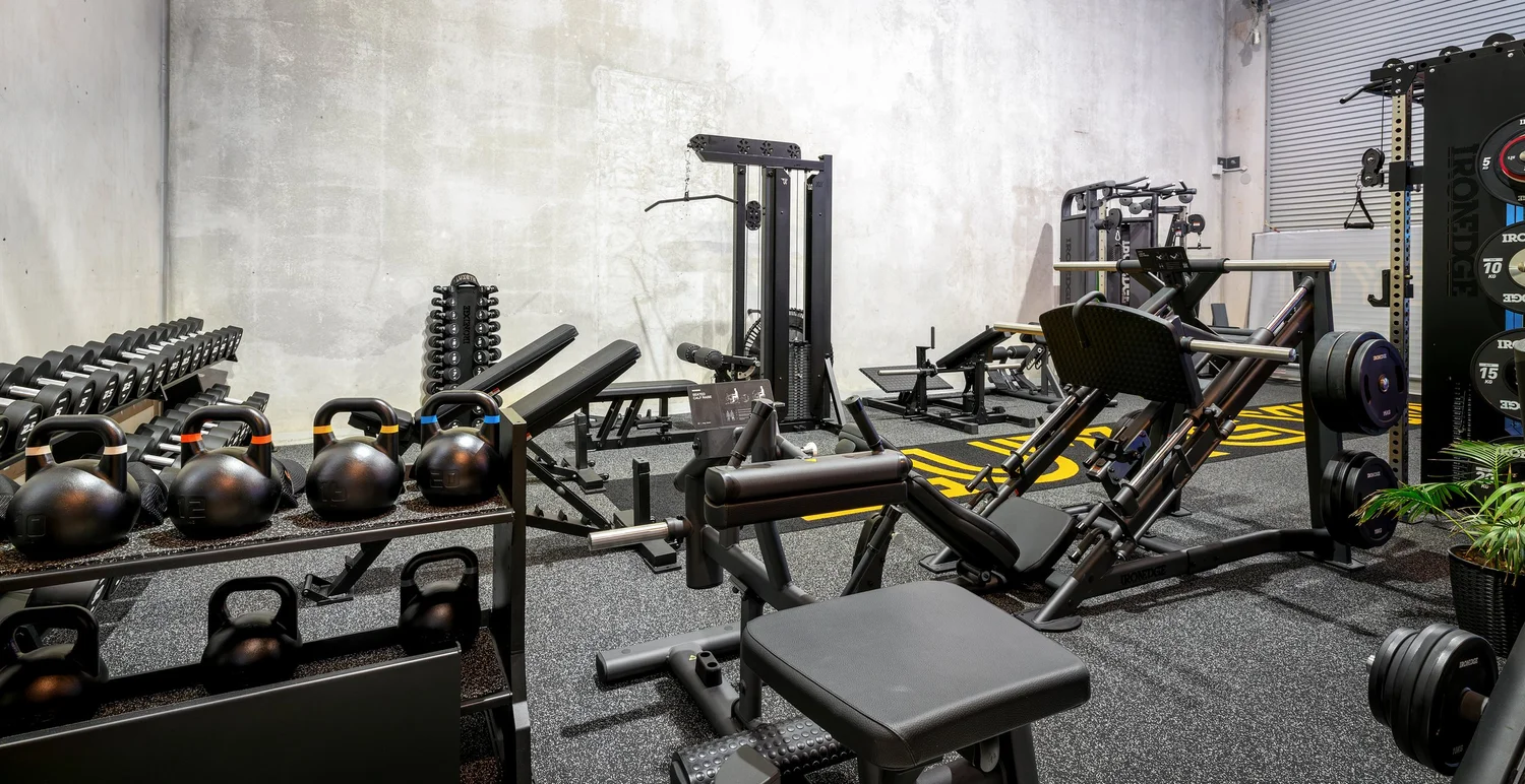 Kettlebells, dumbbells and machines inside the private LUXGYM gym in Cooroy