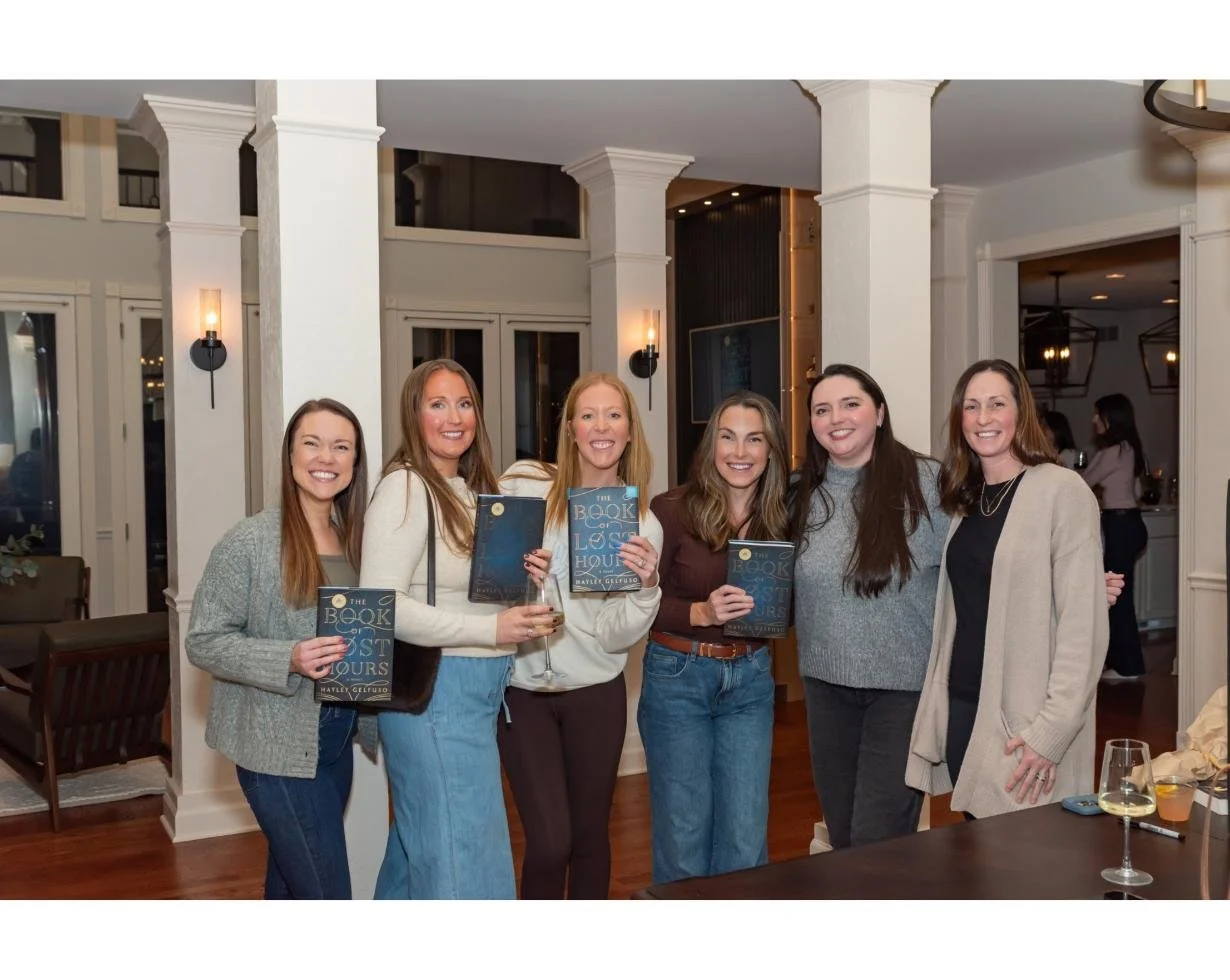 The group with their signed copies