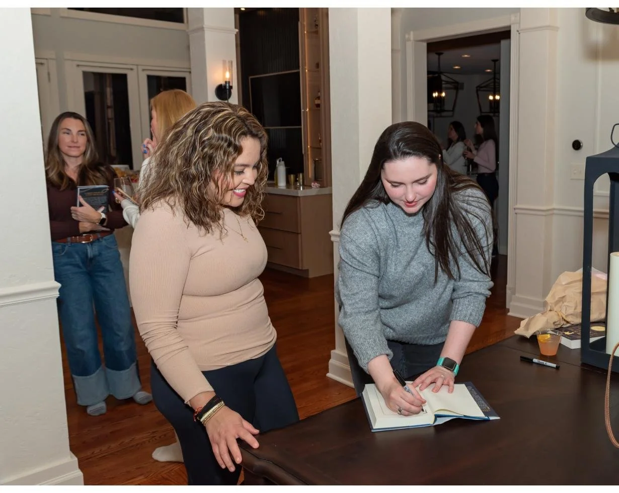 Watching the author sign