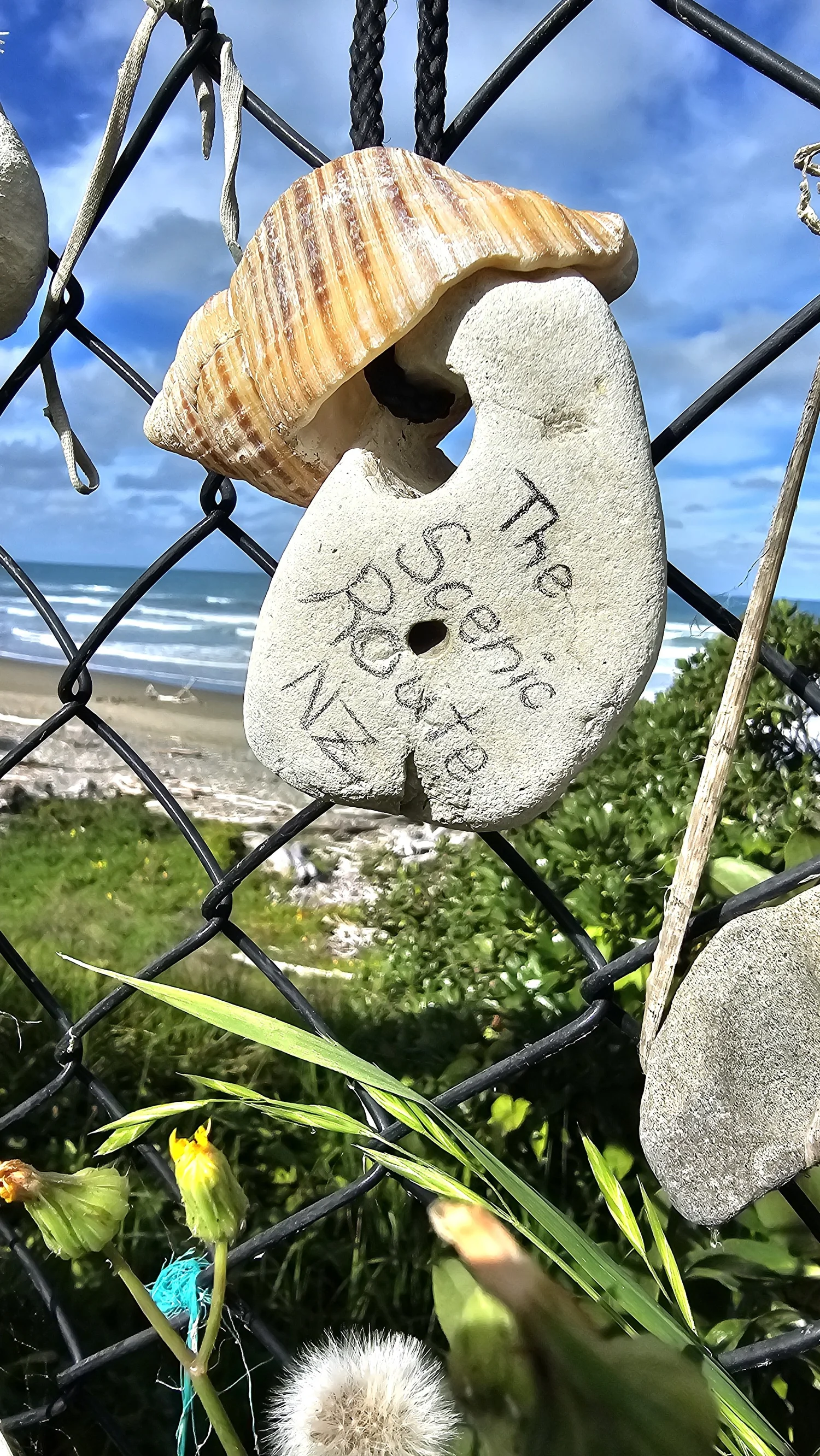 The Scenic Route stone added to the Gore Bay beach fence