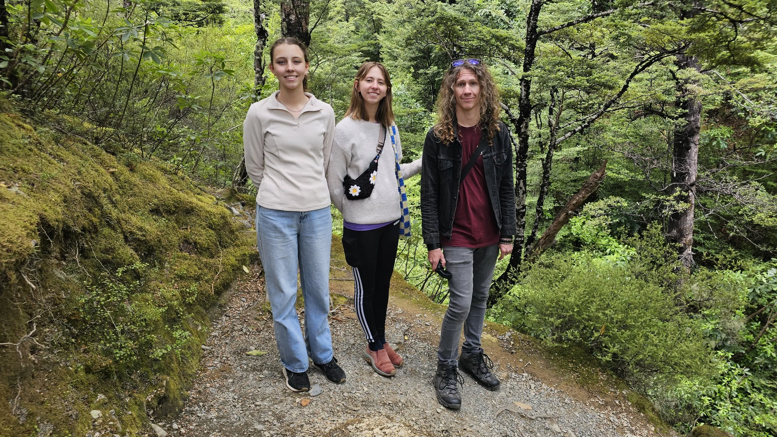 Our family stopping for a photo on the Dog Stream track