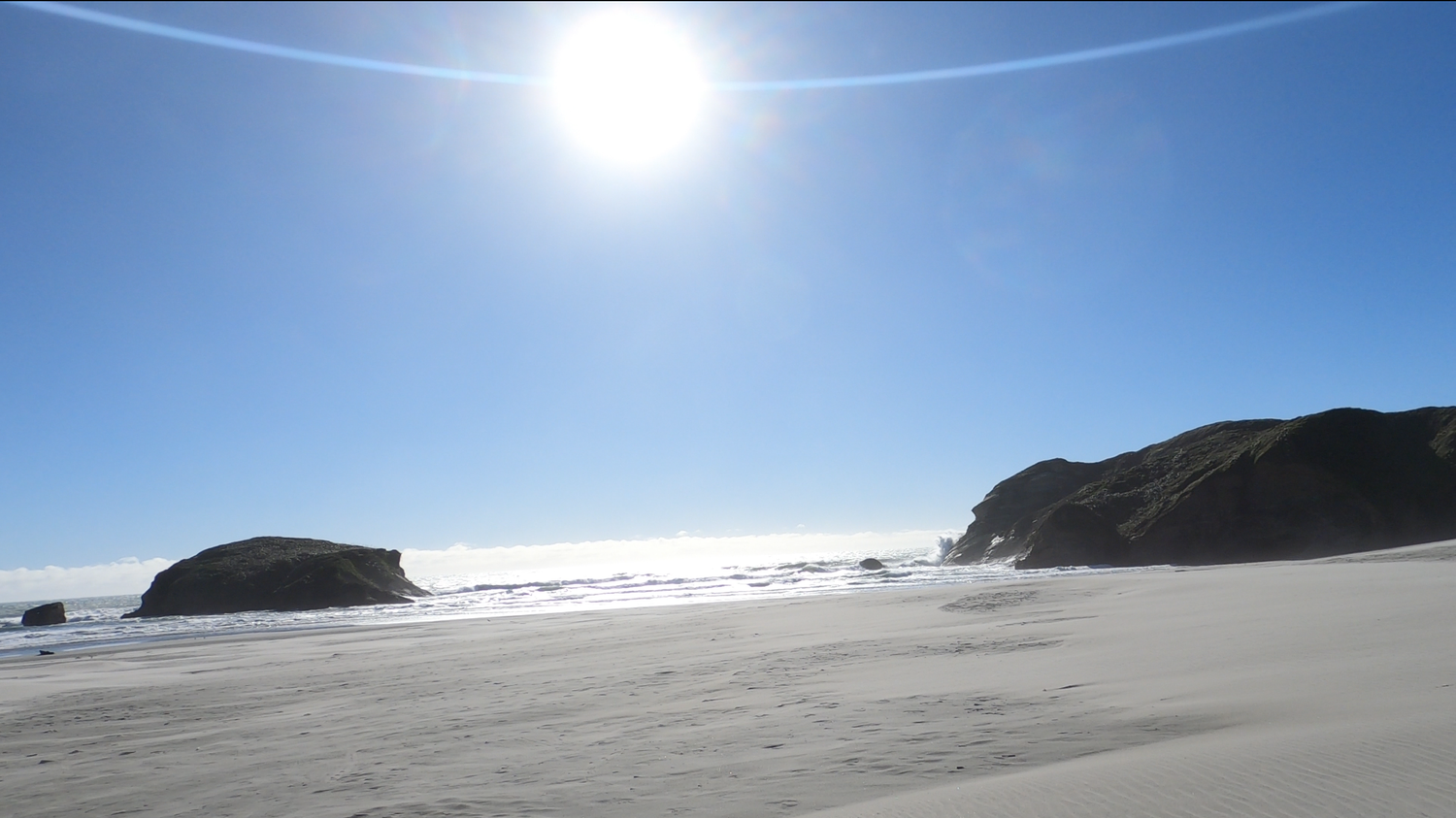 Rough surf and exposed coastline at Wharariki Beach