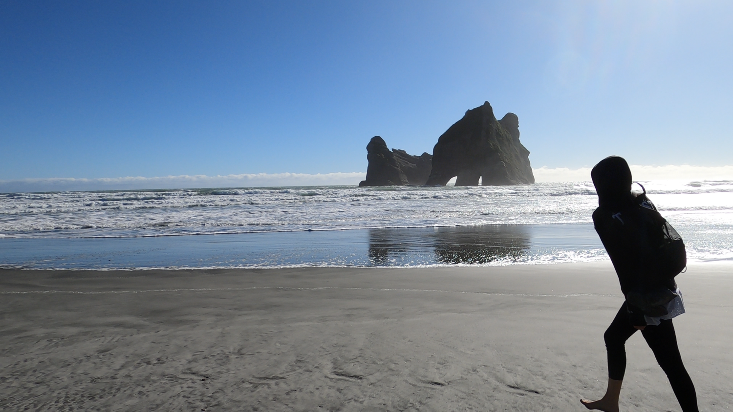 Kristine looking toward the Archway Islands at Wharariki Beach