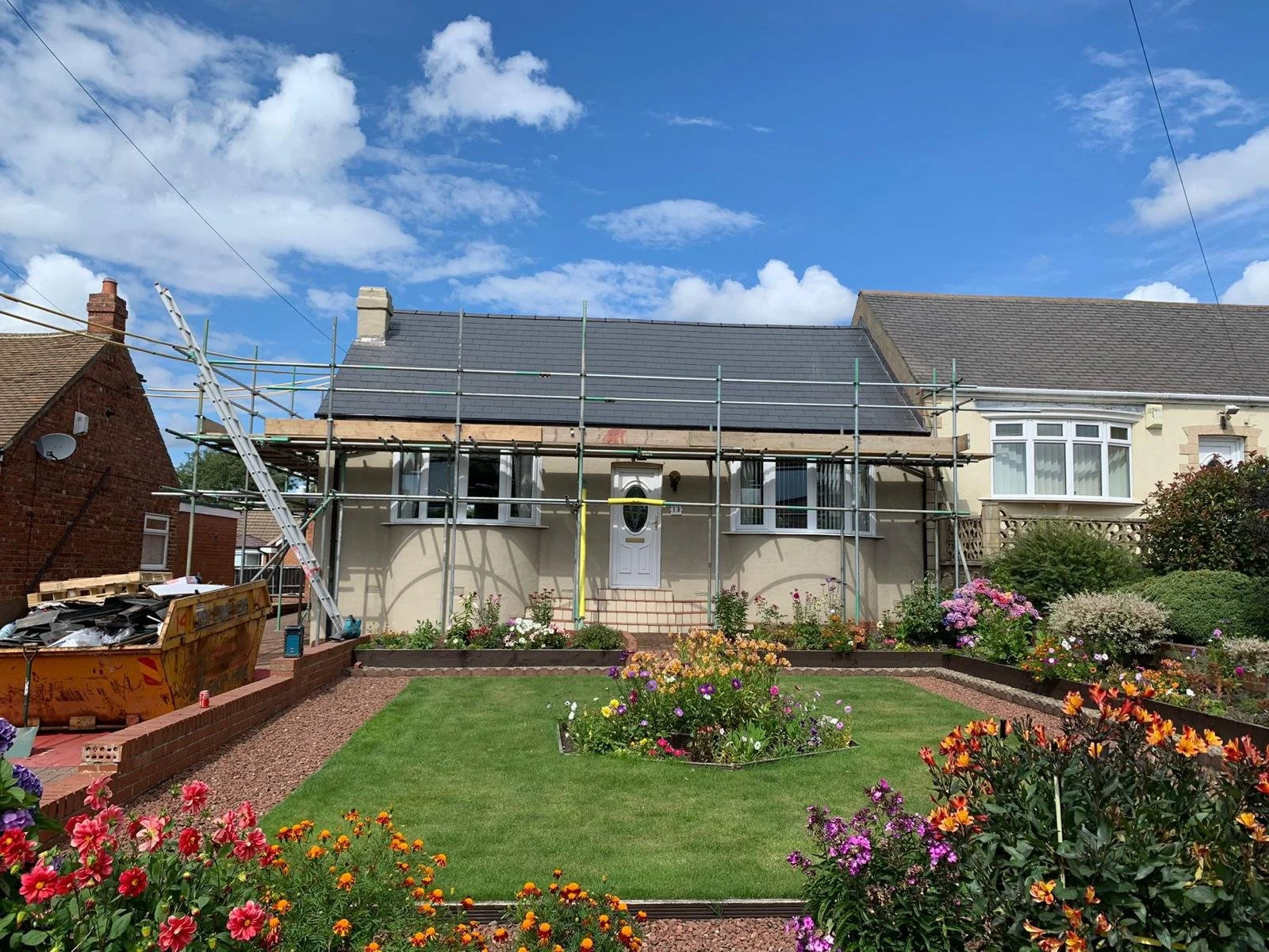 Gosforth Roofing team slating a pitched roof on a property in Whitley Bay