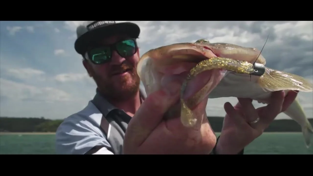 An angler holding a fish in my Sedona product film.