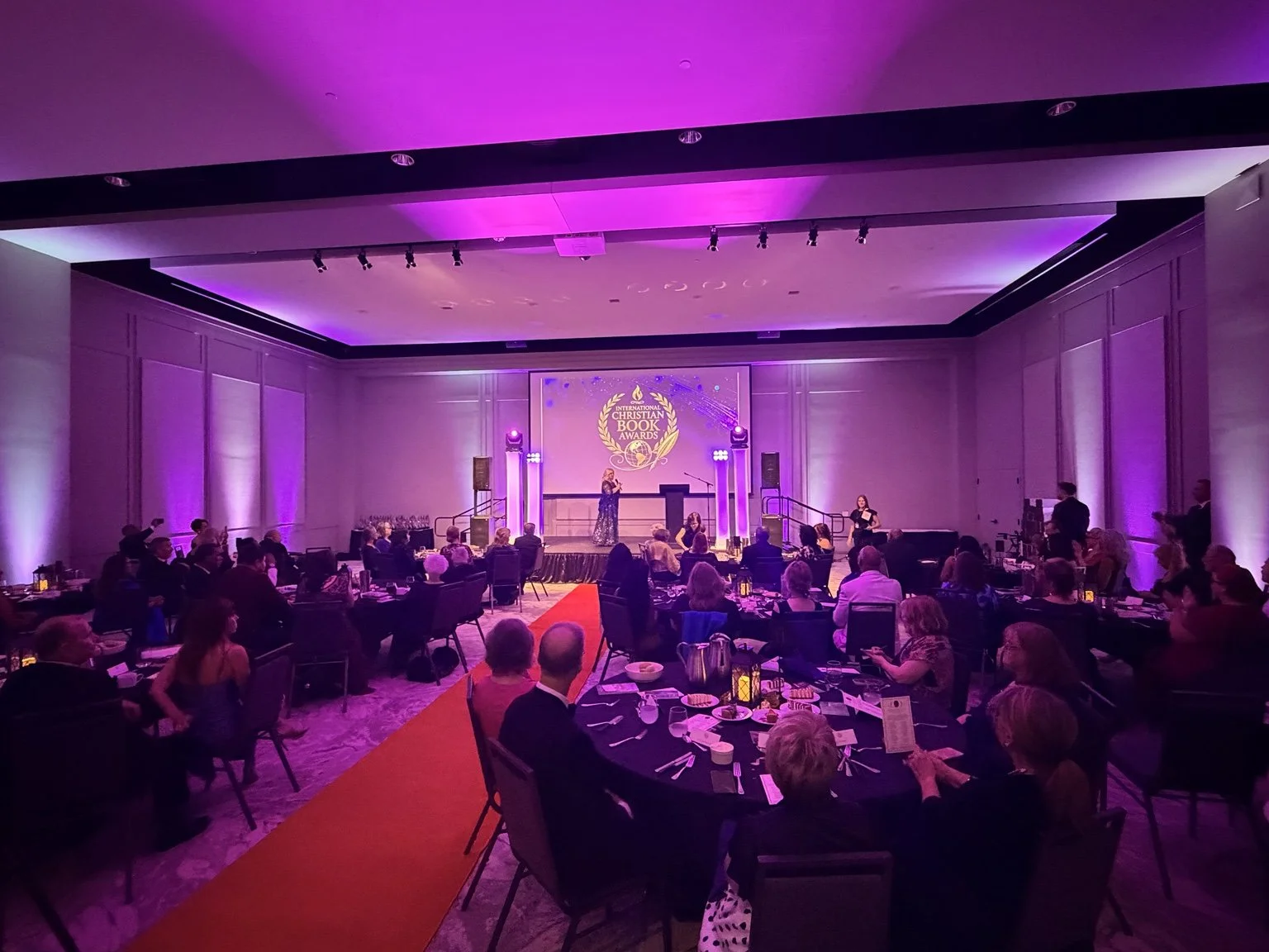 Purple uplighting fills The Pearl Event Center in Fort Wayne during the International Christian Book Awards Conference and Gala.