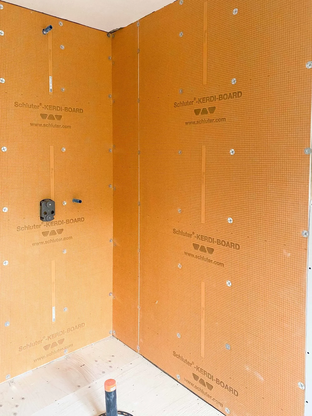 KERDI-BOARD shower wall panels with visible fasteners and plumbing openings in North York