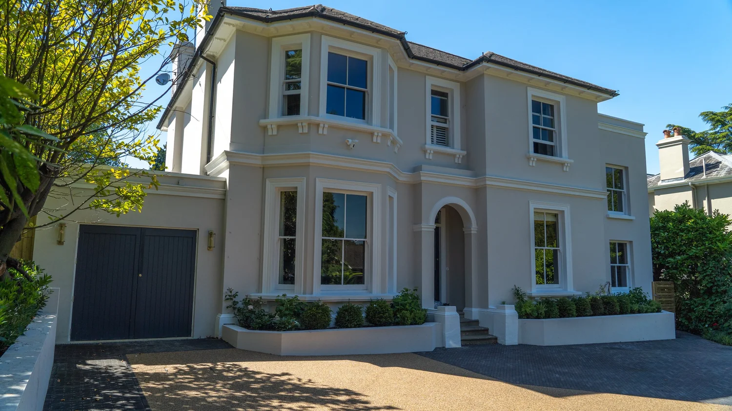 The new garage, entrance steps, planted frontage and driveway brought together at Frant Road.
