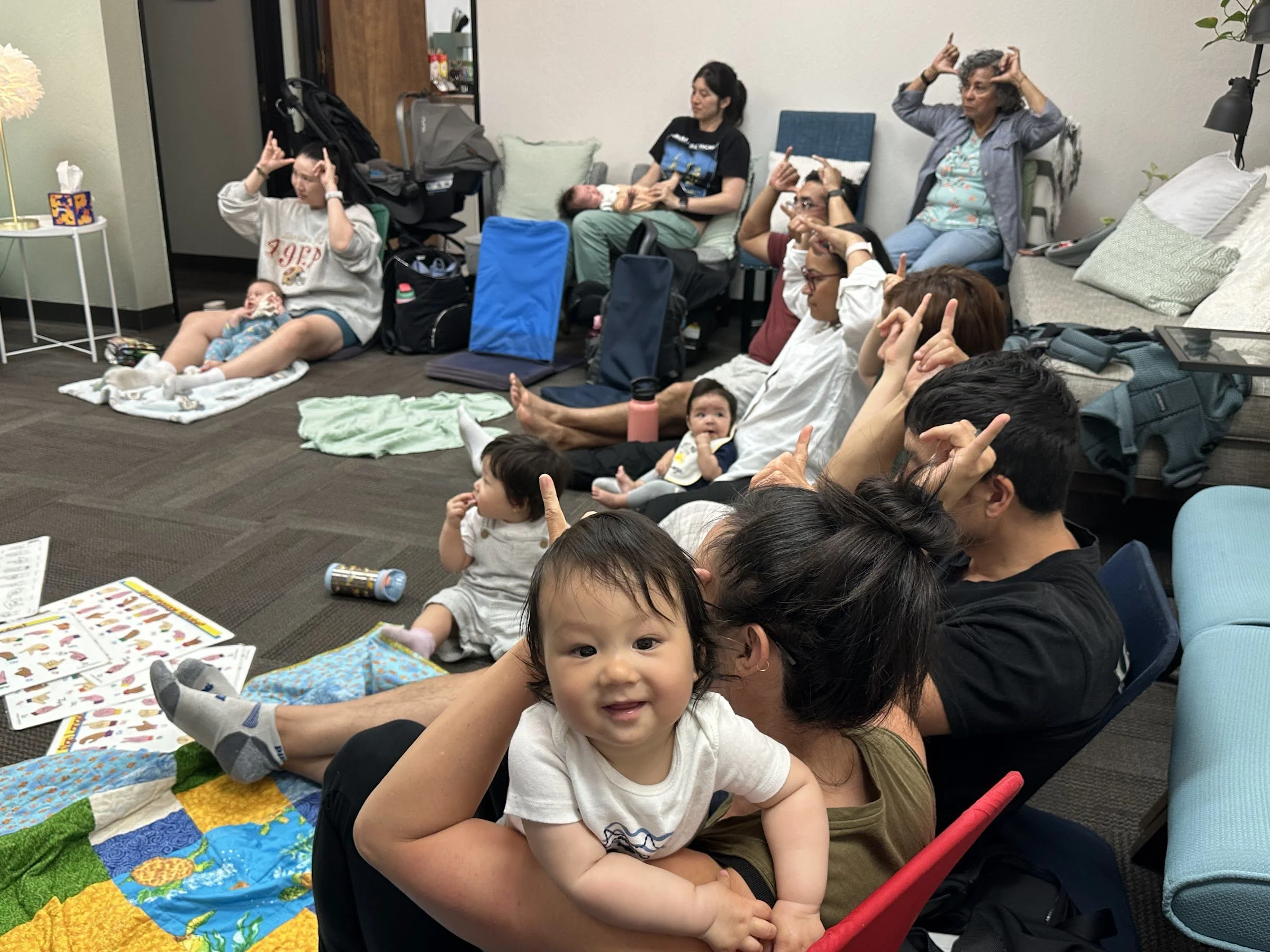 Parents and babies in a class at The Nesting Spot