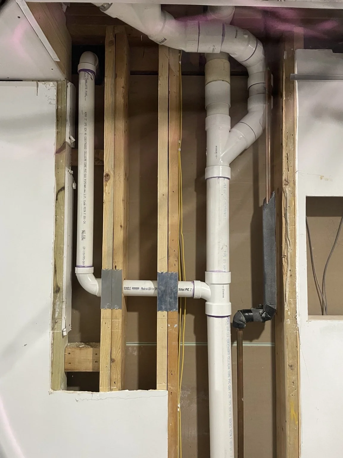 Plumbing rough-in inside framed walls