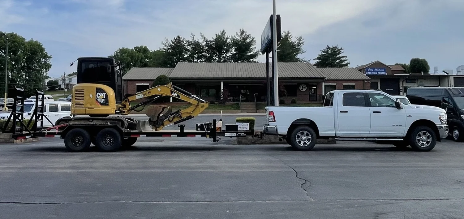 Gibson Plumbing truck with excavation equipment