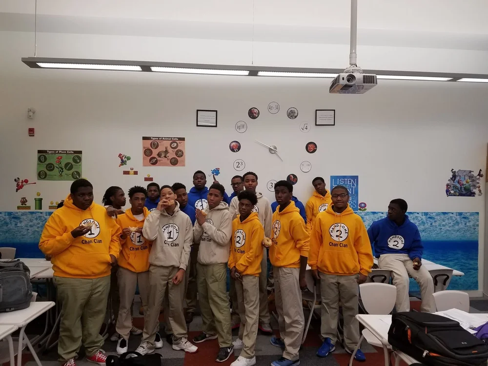 Students in Chan Clan hoodies in a math classroom