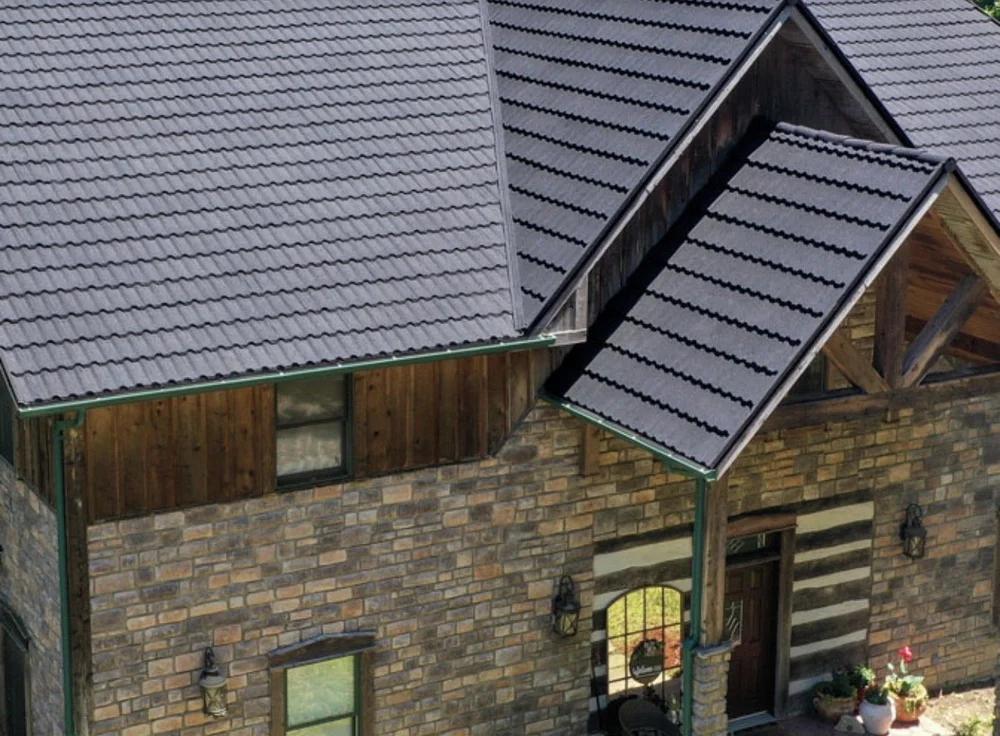 A distinctive roof profile. Metal roof example with a textured, tile-inspired appearance.
