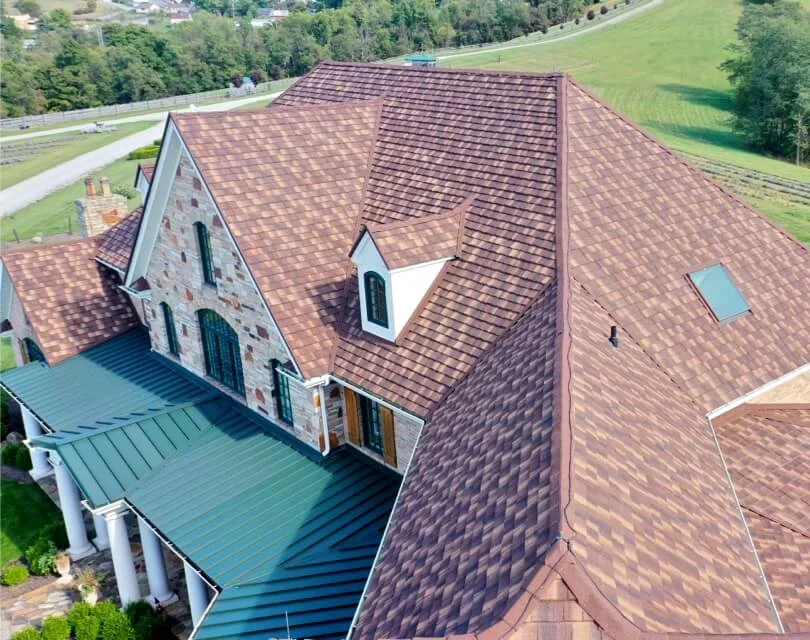 Warm tones. Dimensional style. Fiberglass/asphalt roof example with a warm, varied shingle appearance.