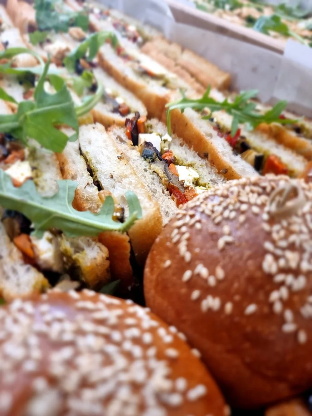 Focaccia filled with roasted vegetables, pesto and feta