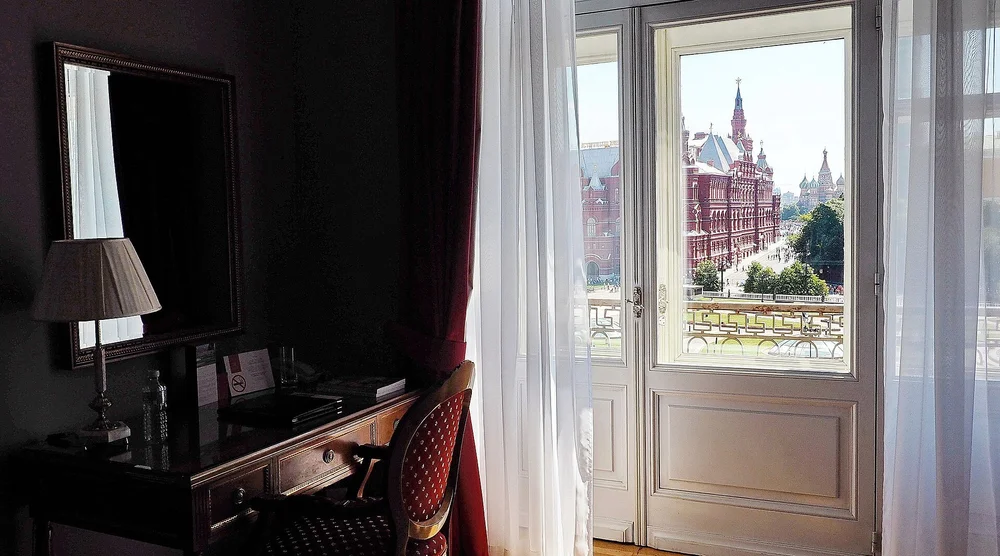 Quiet room with curtains open to a window