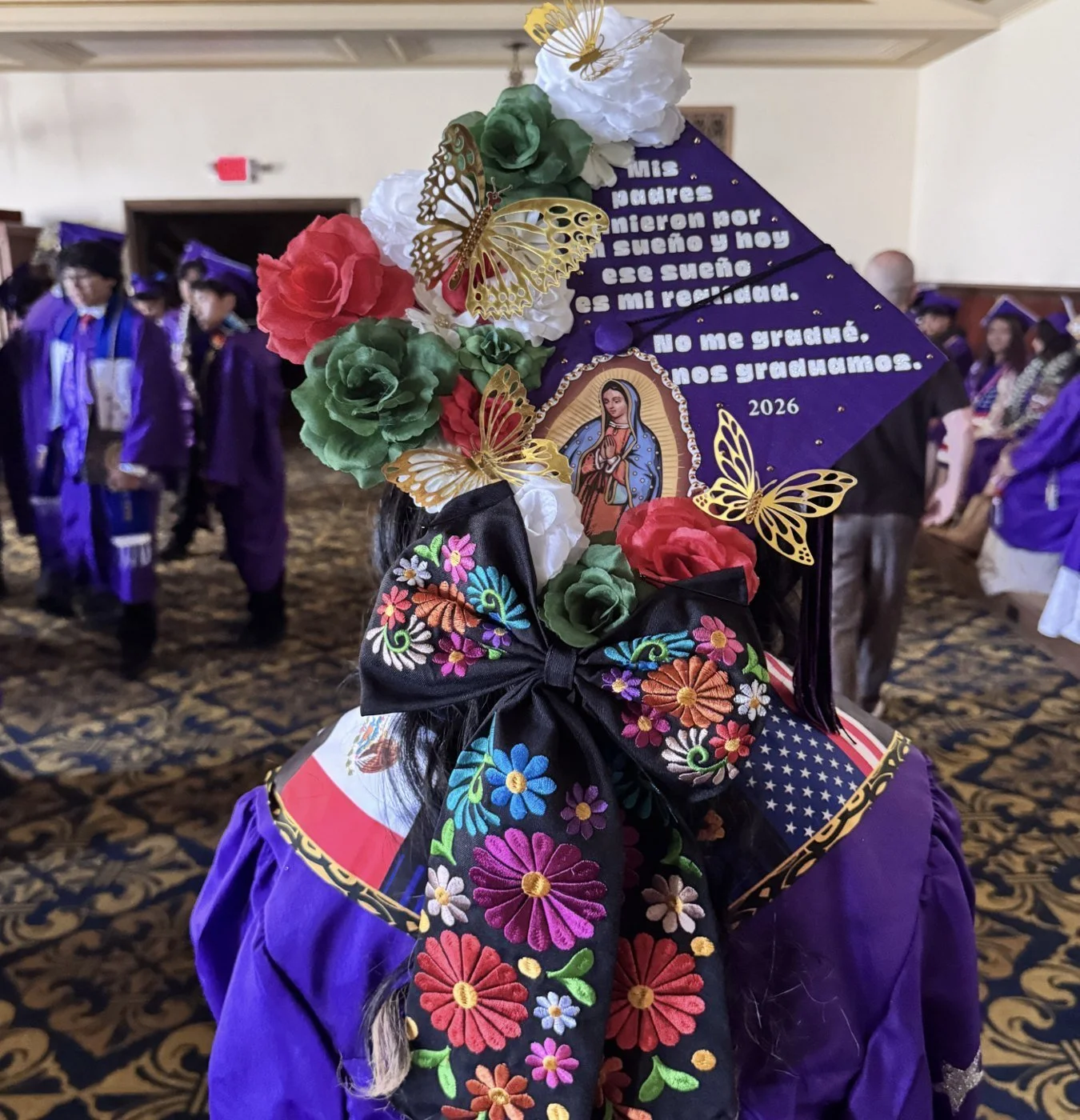 A decorated ARISE graduation cap