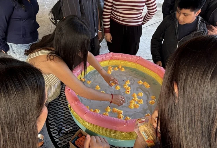 Students playing the duck pond game at Friday FUNday
