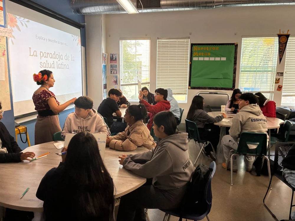 ARISE teacher Lili Trujillo leading a class discussion