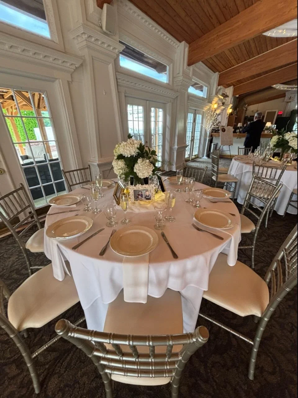 Round banquet table with floral centerpiece