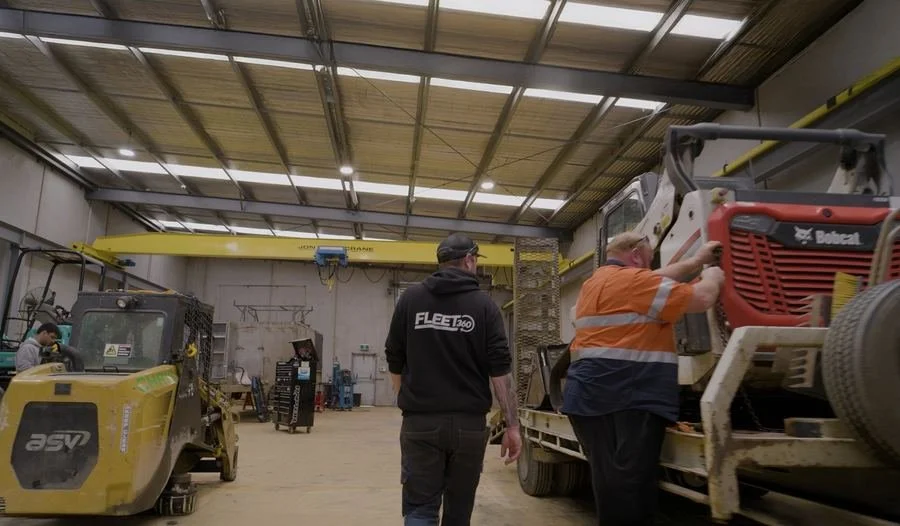 Fleet360 mechanics working on machinery on the workshop floor